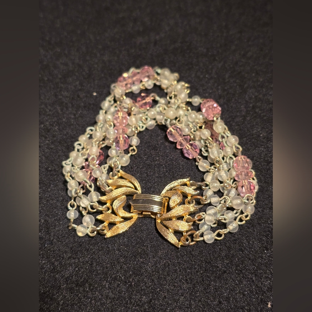 Vintage Lisner pink multi strand bracelet, 7 in.